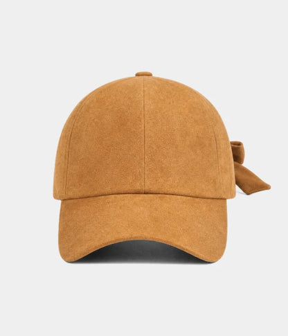 SUEDE BOW CAP.