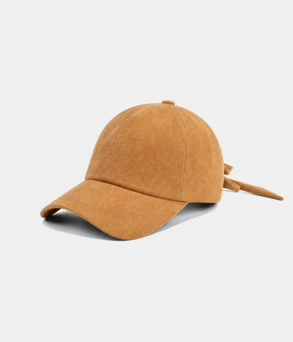 SUEDE BOW CAP.